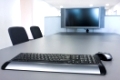Flat screen and computer keyboard in a meeting room