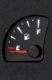 Fuel gauge of a car shows empty tank.