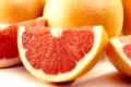 Couple of delishes grapefruits isolated on white. Clipping path included in the file!