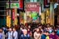 Crowded Shinsaibashi shopping street in Osaka, Japan, Faces defocused