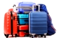 Luggage consisting of large suitcases and rucksacks isolated on white.