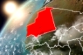 Mauritania during sunset highlighted in red on planet Earth with clouds and visible country borders. 3D illustration. Elements of this image furnished by NASA.