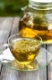 Herbal tea with dill in a glass cup outdoors